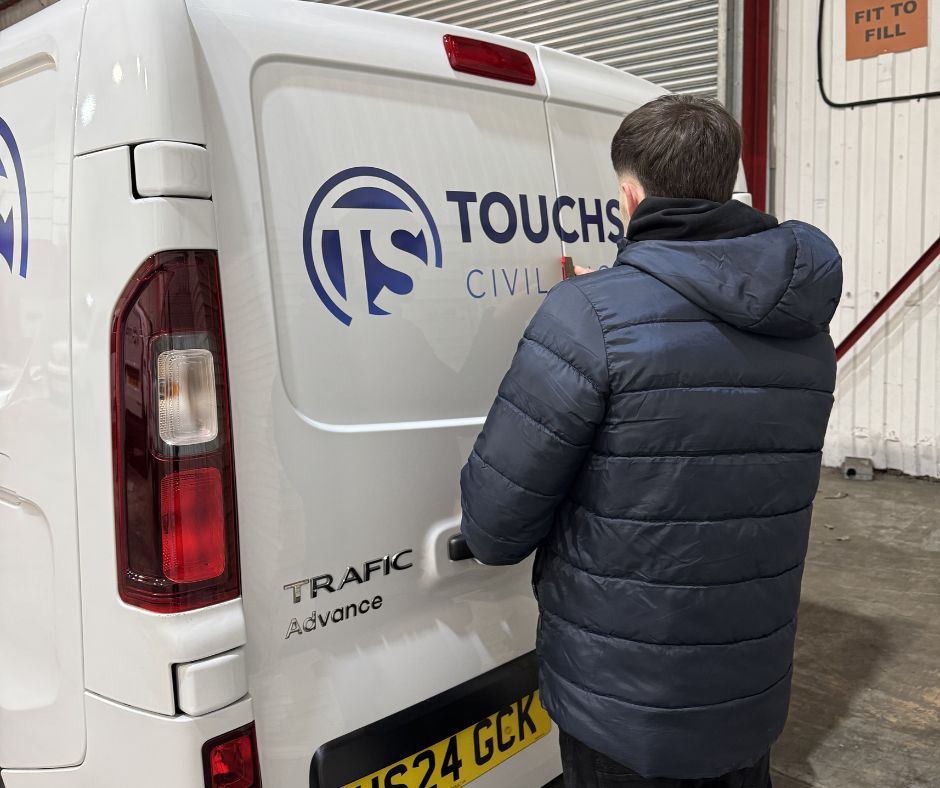 Vehicle graphics being fitted