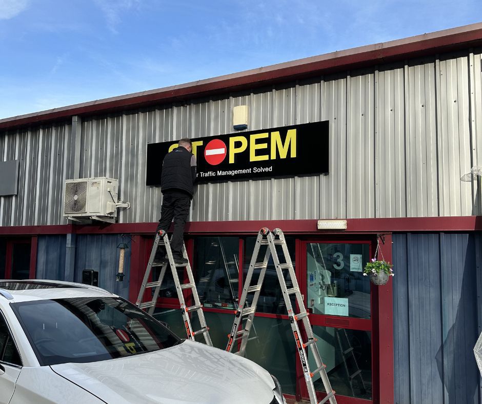 Sign fitting